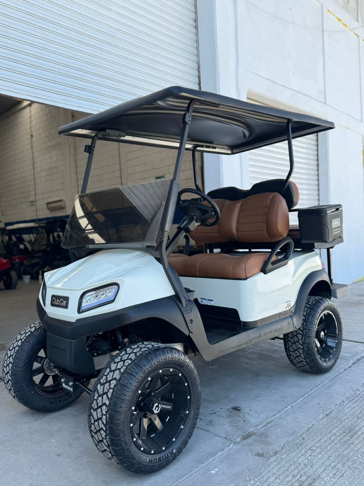 White 4-Seater Lifted — Lift Kit · Off-Road Tires · Tan Interior